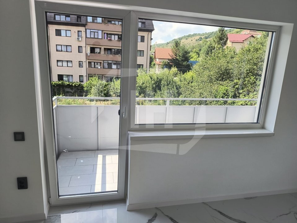 Apartament 2 camere finisat, etaj 1,  zona Regal Baciu